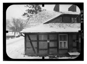 Baruth/Mark-Glashütte, Hüttenweg 8. Arbeiterwohnhaus (um 1840). Gartenfront (Teilansicht)