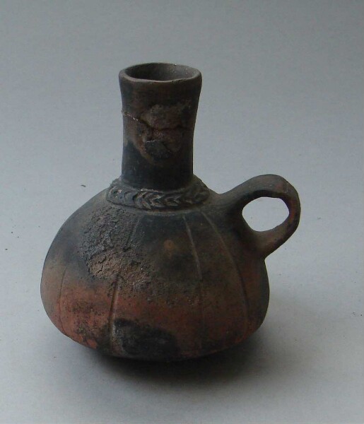 Clay bottle with handle