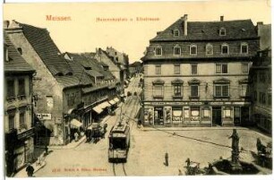 Meißen. Heinrichsplatz. Elbstraße mit Straßenbahn und Denkmal