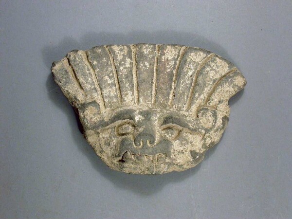 Fragment of a clay vessel