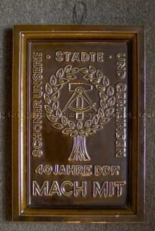 Wandplakette der Mach-mit-Bewegung