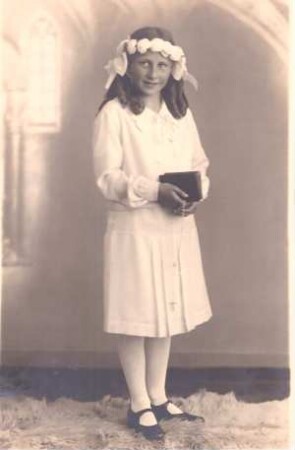 Foto Mädchen im Kommunionskleid