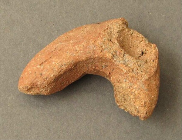 Fragment of a clay vessel