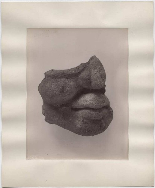 Part of a face made of stucco from Mound No. 16