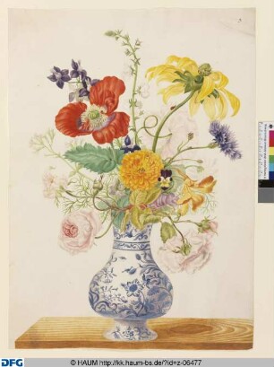 Blumen in einer blau-weißen Porzellanvase
