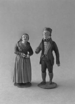 Zwei Figuren in bäuerlicher Tracht