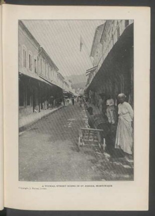 A typical street scene in St. Pierre, Martinique - [Photograph] : Copyright, J. Murray Jordan.