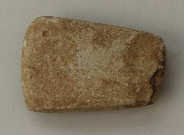 Stone axe blade (fragment)