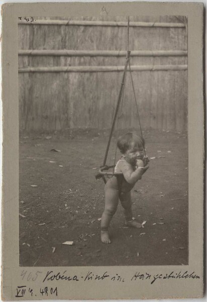 Kobéua child in a hammock chair