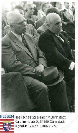 Stock, Christian (1884-1967) / Porträt auf der Frankfurter Ministerpräsidentenkonferenz, sitzend, Ganzfigur / Gruppenaufnahme, v. l. n. r.: Christian Stock; John Jay McCloy (1895-1989)