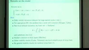 On the stability of Bloch walls in a dynamical model with eddy currents
