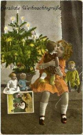 Weihnachtskarte mit Mädchen und ihren Puppen