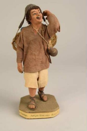 Genrefigur "Mann mit Gepäck"