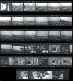 Schwarz-Weiß-Negative mit Aufnahmen aus Den Haag (leere Terrassen in Scheveningen, Glashäuser vor Delft, Rheinmündung mit Schiff, Hotel-Telefonistin)