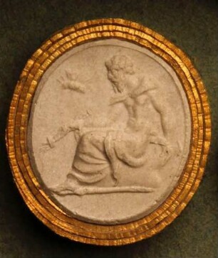 Sitzender Prometheus mit einer brennenden Fackel, darüber ein Schmetterling (Daktyliothek, Zweites Historisches Tausend)