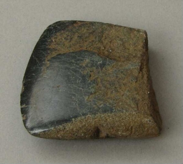 Stone axe blade (fragment)