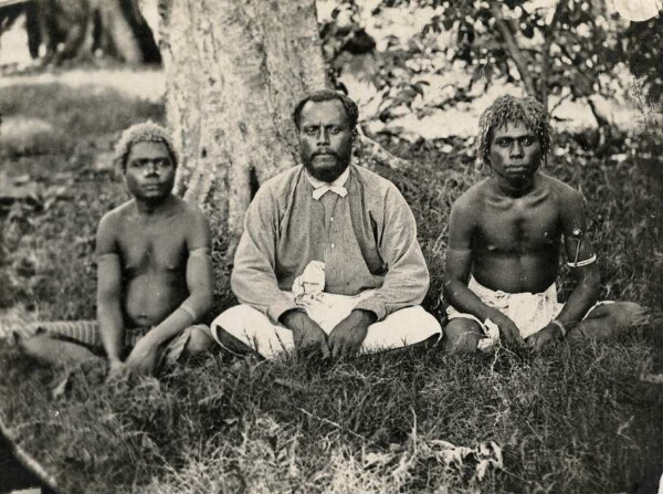 "A Tonga teacher and two natives"