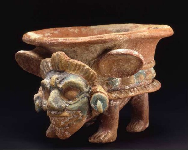 Vessel with head of god with deer ears