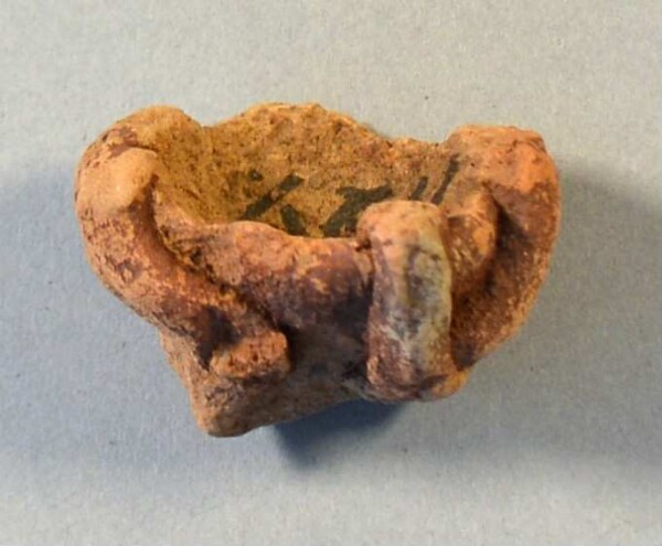 Fragment of a clay vessel decoration