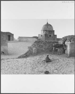 Dorf der Souf-Region : Kind und Krugesel am Brunnen in einem Dorf der Souf-Region in der Nähe der algerischen Stadt El Oued