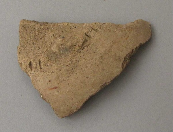 Clay shard of a vessel