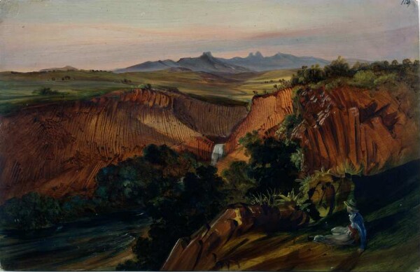 Basalt gorge of San Miguel Regla. On the right in the foreground, a woman sitting on a rock pedestal.