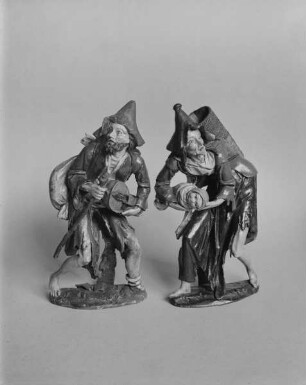 Bettler und Bettlerin mit Wickelkind