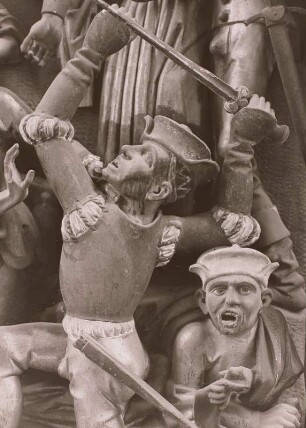 Flügelaltar : Flügelaltar. Holz, geschnitzt, gefaßt (1480/1510). Detail mit Kriegsknechten, die sich um den Mantel Christi streiten, aus der Kreuzigungsszene im Mittelschrein. Salzwedel, Marienkirche