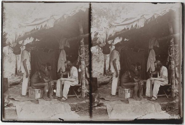 Wilhelm Kissenberth shows two Kayapó Indians how to construct a hunting rifle