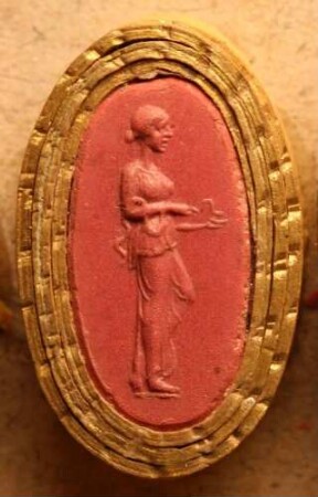 Hygieia, auf einem Hund sitzend