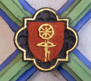 Schlussstein mit Wappen mit einem Rad und einer Armbrust