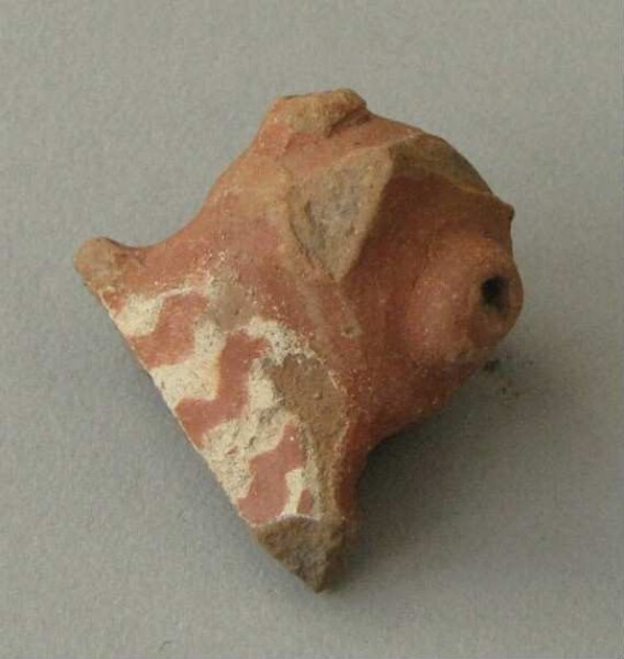 Clay animal head (fragment)