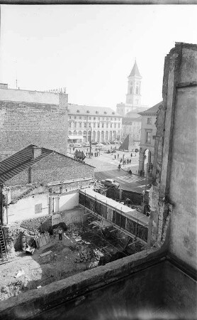 Bau des neuen Wohn- und Geschäftshauses Kaiserstraße 82.