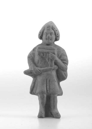 Musikant mit Syrinx und Aulos