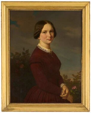 Junges Mädchen mit Rose in der Hand