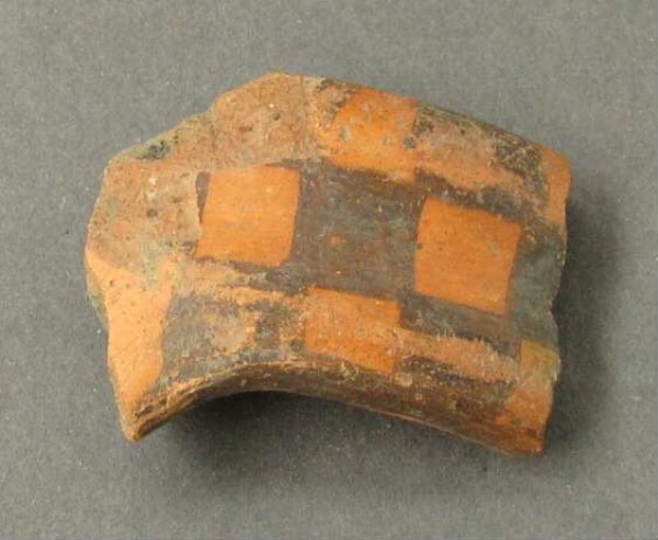 Fragment of a clay vessel