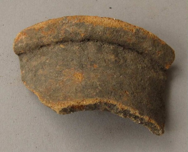 Rim piece of a clay vessel