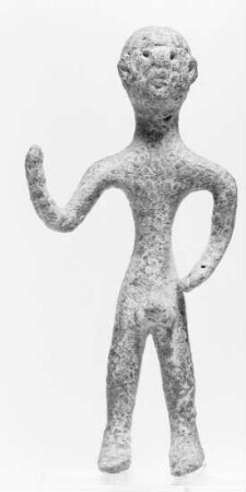 Geometrische Statuette eines nackten Mannes mit erhobenem Arm