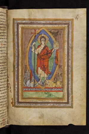 Miniatur mit Blatttwerkrahmung: Christus victor mit Kreuzstab und Buch in der Mandorla tritt auf Drache und Löwe