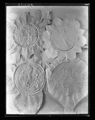 Fotografie von vier Dienstsiegeln Aue Camburg Tümpling Kleingestewitz