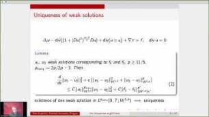 Uniqueness and regularity of flows of non-Newtonian fluids with critical power-law growth