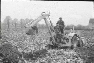 Traktoranbaubagger MF 710 (Massey-Ferguson)