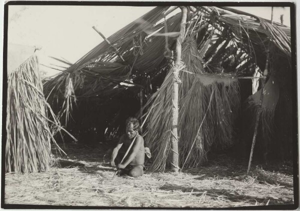 Making the wooden horns of a dance mask (Canela)