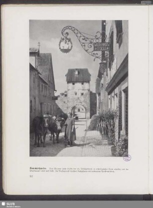 Sommerhausen. Das Maintor (erste Hälfte des 16. Jahrhunderts9 in ursprünglicher Form erhalten, mit der Stadtmauer rechts und links