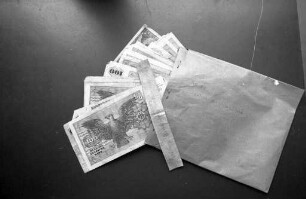 Rückgabe von 4800 DM aus einem Überfall auf die Filiale Neureut der Volksbank Karlsruhe durch die Täter
