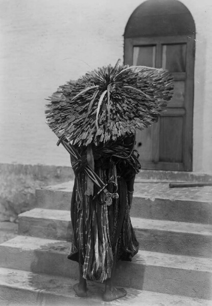 Man with feather headdress