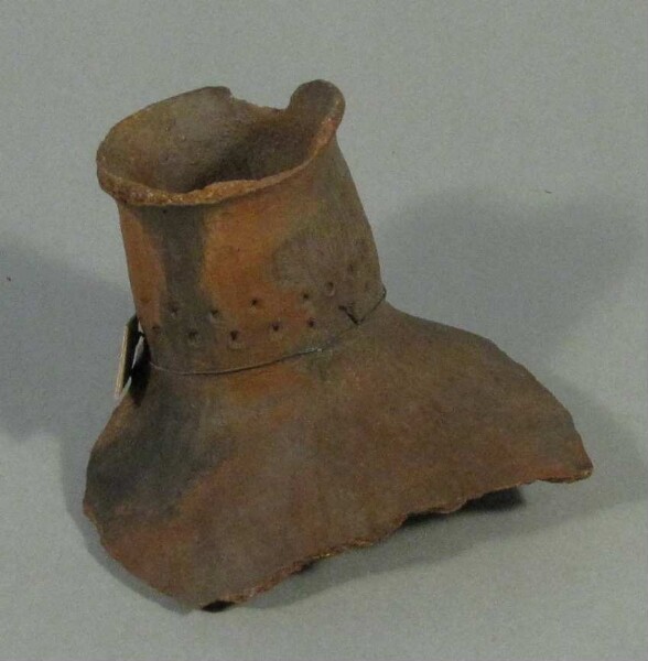 Fragment of a clay vessel