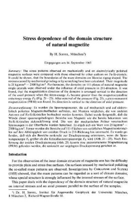 Stress dependence of the domain structure of natural magnetite
