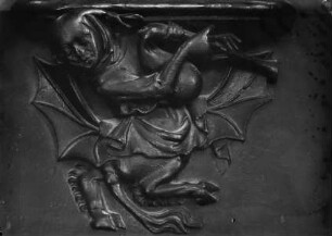 Chorgestühl N II 4: Mischwesen mit Dudelsack