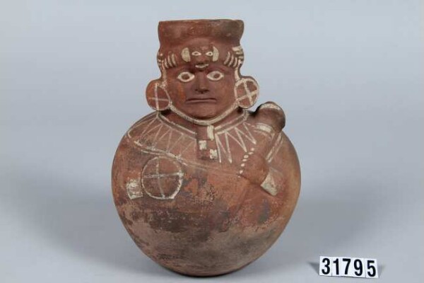 Vessel in the shape of a person with weapons